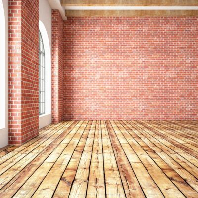 empty-room-with-brick-walls-and-wooden-floors